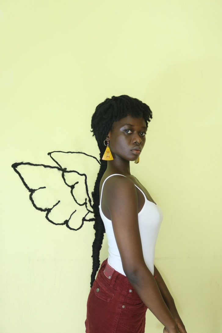 Laetitia Ky強(qiáng)壯的頭發(fā)和強(qiáng)有力的信息